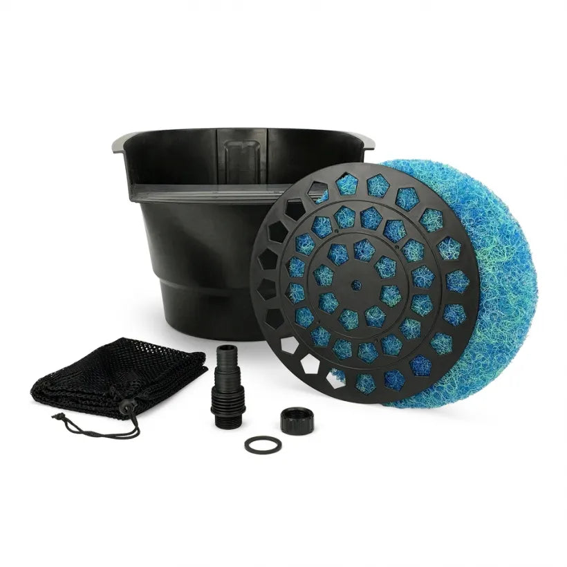 A pond waterfall filter system including a black plastic basin, blue filter material, black and blue pump components, and other filtration media.